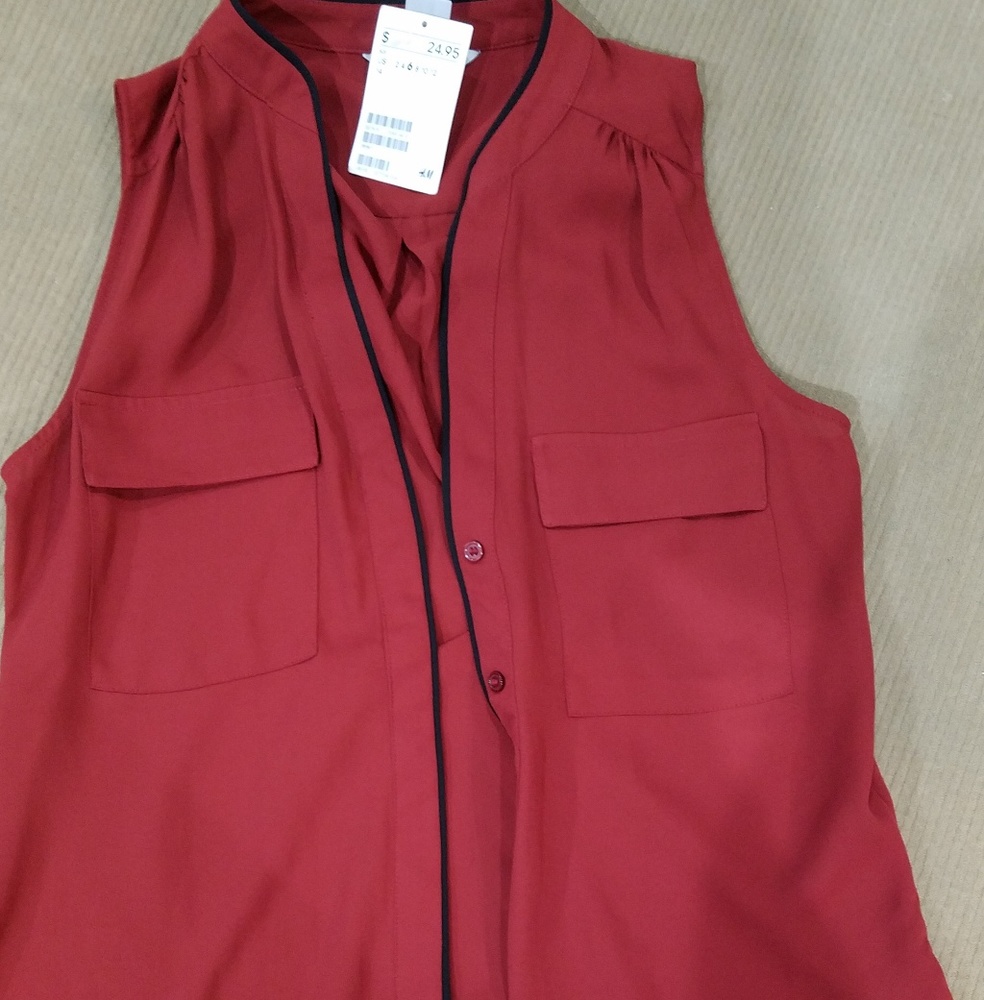 Brand new Sleveless top
